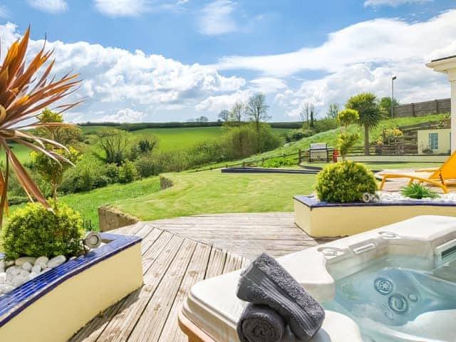 Luxurious hot tub with fantastic view | Pentire, Holbeton, near Ivybridge