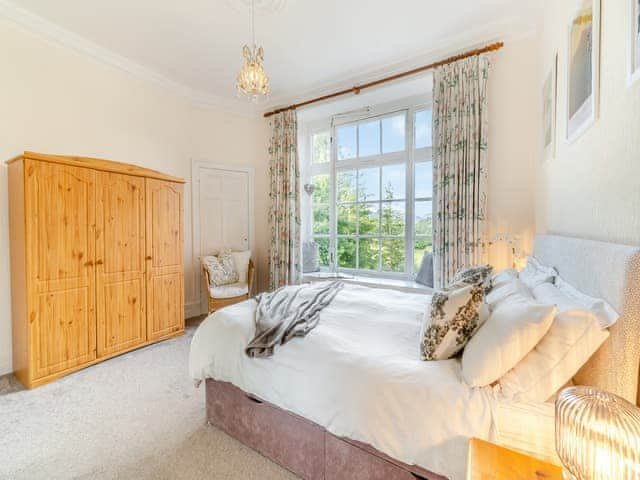 Master bedroom with king bed and beautiful view | Crag View, Ambleside