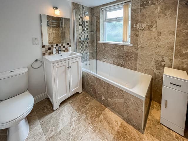 Beautiful bathroom with shower over bath | Green Ghyll, Keswick