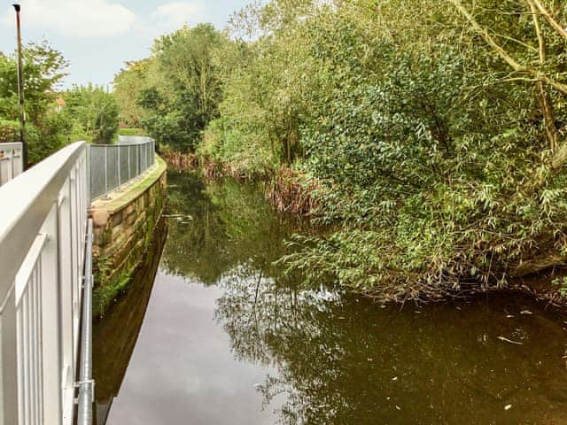 View from just outside the garden gate. Bridge with footpath leading to Thirsk town | Beck Cottage, Thirsk