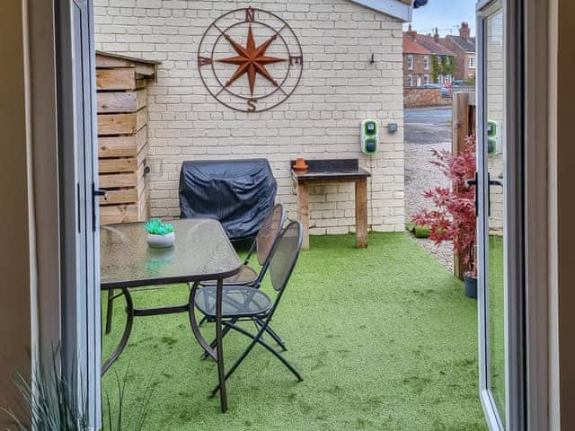 Sitting-out-area | Duck Cottage, Tholthorpe, near York