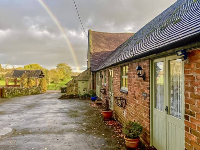 Ample parking for guests in the barn yard | Honeysuckle Cottage - Brookfarm Cottages, Middle Mayfield, near Ashbourne