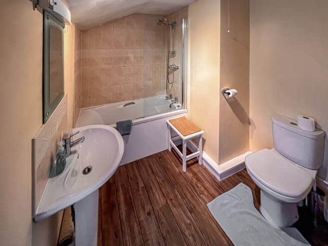 Family bathroom with shower over bath | Church Street, Ambleside