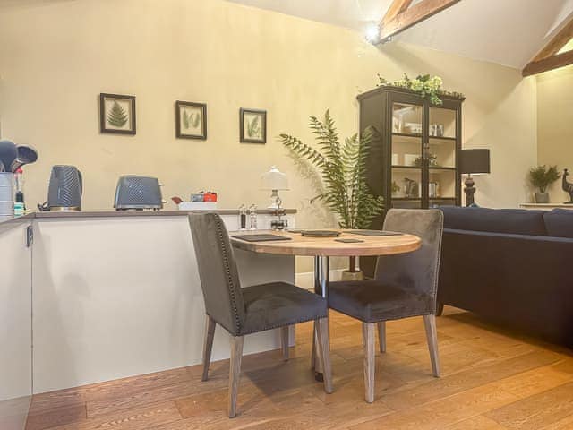 Sleek kitchen with convenient dining area | Sykelands Cottage - Sykelands Grange Cottages, Dalton near Richmond