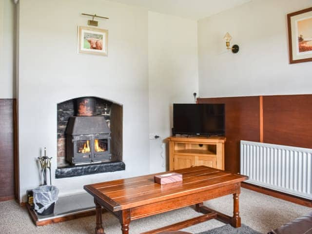 Living room | Cozy Cow Cottage, Belford