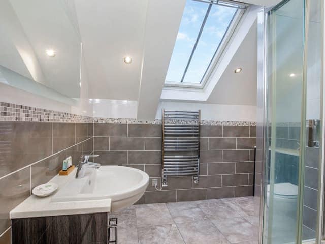 Wonderful tiled bathroom with heated towel rail | The Granary - Holtby Grange Cottages, Holtby, near York