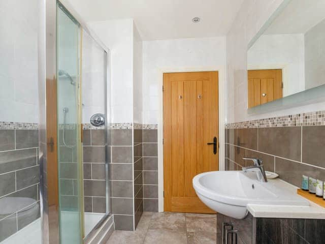 Wonderful tiled bathroom with heated towel rail | The Granary - Holtby Grange Cottages, Holtby, near York