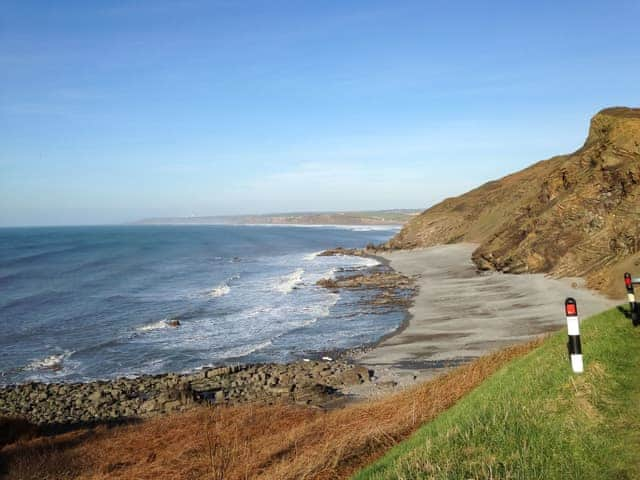 Millook with Interesting cliff strata on a secluded beach | Downhouse - Downhouse Cottages, Trebarwith, near Delabole