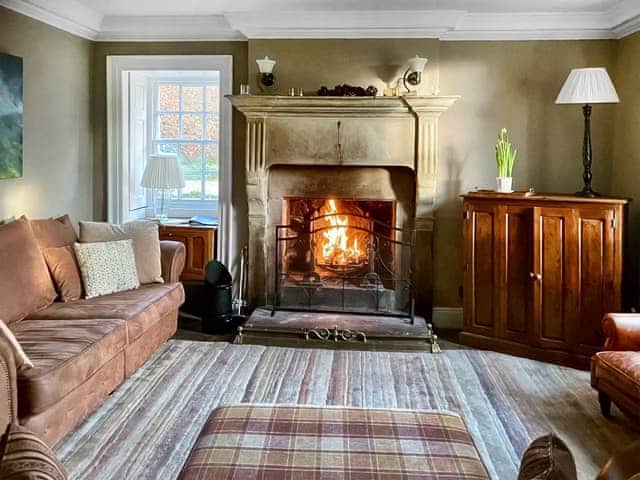 Lounge with original open fireplace | Bradley Hall, Matlock