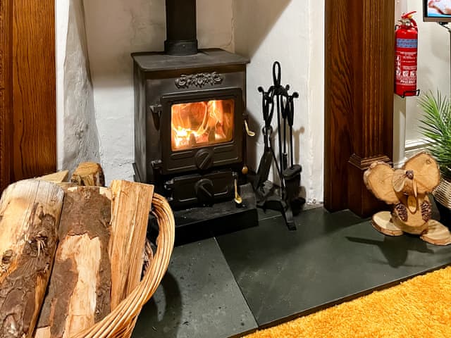 Characterful living room with wood burner | Hidden Cottage, Lowick, near Coniston