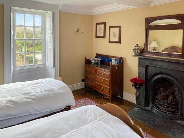 Twin bedroom (1st floor) with original fireplace | Bradley Hall, Matlock