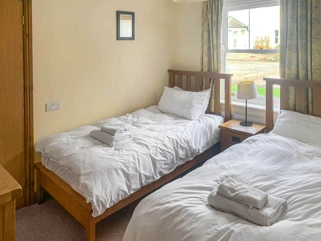 Stylish twin bedded room | 1 Lonsdale House - Greta Grove Apartments, Keswick