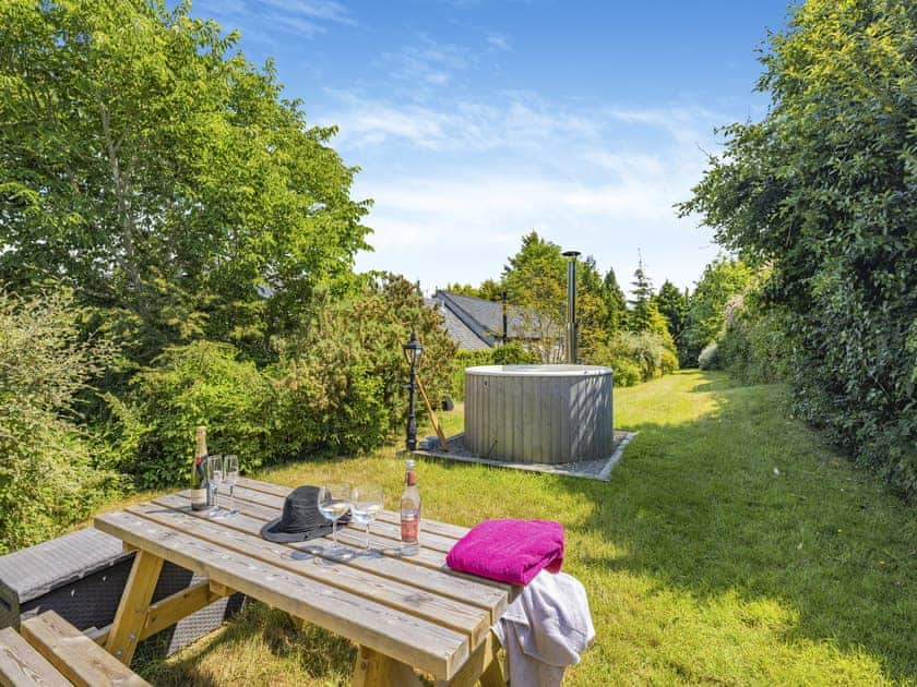 Sitting-out-area, cottages hot tub  | Bluebell Cottage - Pen y Bryn Farm and Holiday Cottages, Betws Yn Rhos