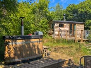 batts about woodland retreats. hot tub view | Bats About - Woodland Retreats, Millom