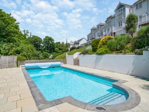 Swimming pool | Garden Apartment, Hallsands