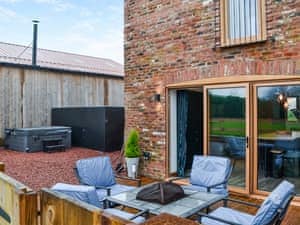 Sitting-out-area | Cart House - Clapham Holme Farm Cottages, Great Hatfield, near Hull