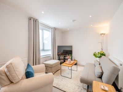 Living room | Hollyhocks- The Loft at The Gatehouse - Hollyhocks, Holt