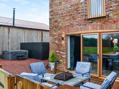 Sitting-out-area | Cart House - Clapham Holme Farm Cottages, Great Hatfield, near Hull