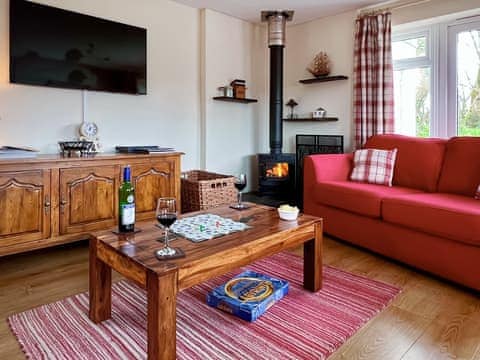 Charming living area with wood burner | Blackberry Cottage, Coads Green, near Launceston