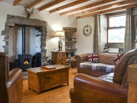 Cosy living room with wood burner | Daisy Cottage, Kelbrook, near Skipton