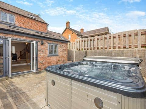 Hot tub | Y Stabl - Vale of Llangollen Farm Cottages, Trevor, near Llangollen