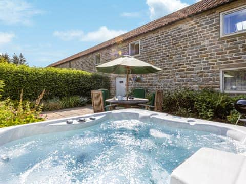 Beautiful private patio area with hot tub | Oak Cottage, Harwood Dale, near Scarborough