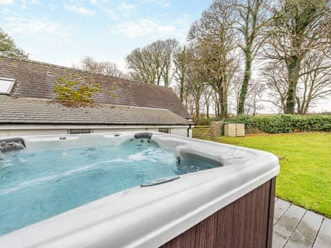 Hot tub | Blacksmiths Cottage, Roch