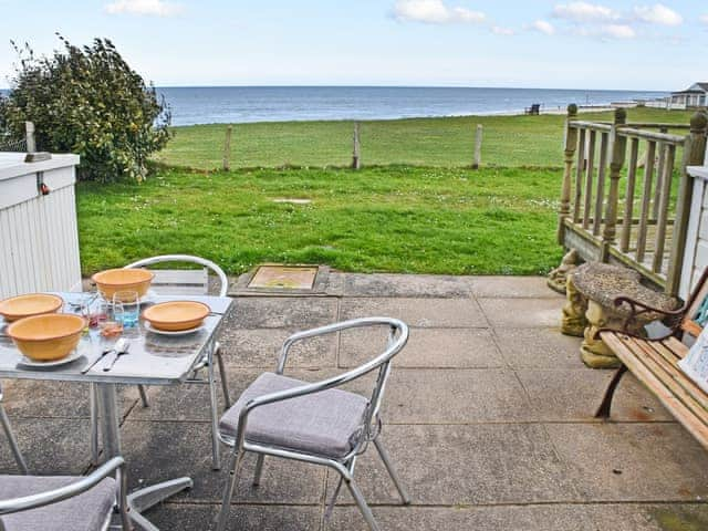 Sitting-out-area | Bacton Seaview Bungalow, Bacton