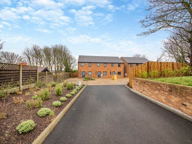 External elevation showing private parking | Curlew Retreat, Ellington, near Druridge Bay