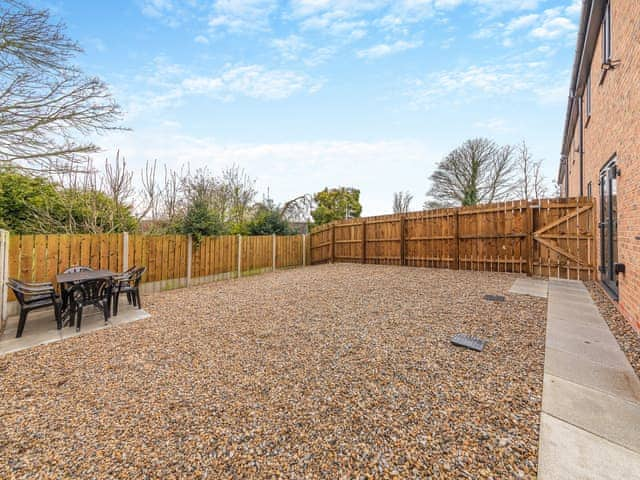 Exterior path leading to enclosed garden | Sandpiper Rest, Ellington, near Druridge Bay