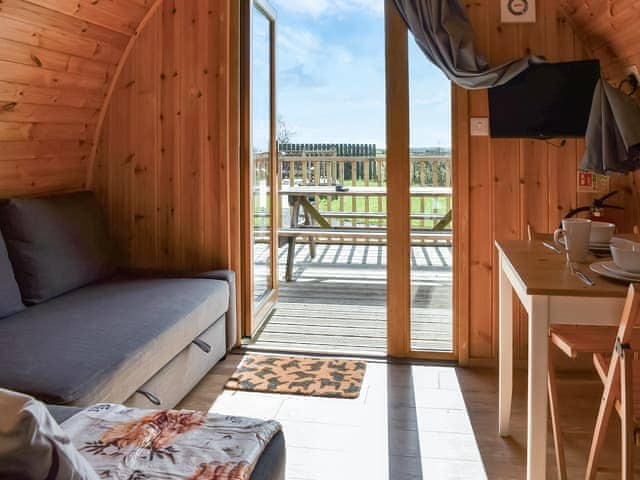 Convenient open-plan living space | Manx View - Moorside Glamping Pods, Corney, near Millom