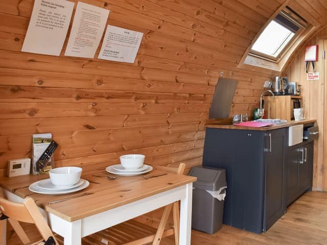 Intimate dining area and kitchen | Selker View - Moorside Glamping Pods, Corney, near Millom