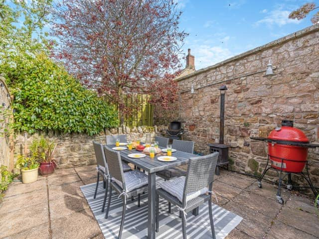 Sitting-out-area | Bamburgh Cottage, Beadnell