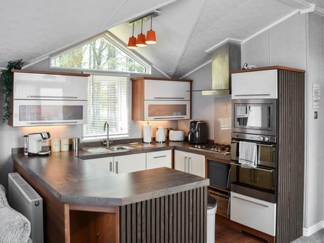 Kitchen | Solway Escape - Meadow Retreat Lodge Park, Moota, near Cockermouth