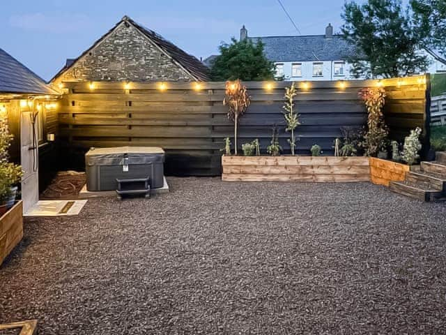 Private enclosed outdoor area with hot tub | The Byre - Barn Escapes, Ilfracombe