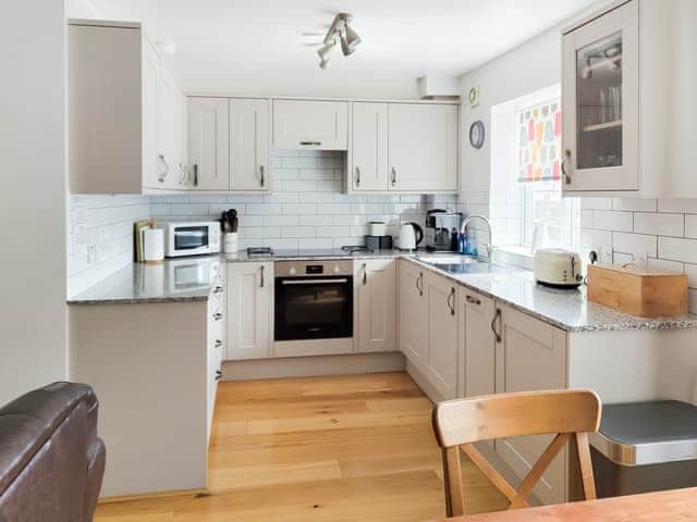 Well equipped kitchen with dining area | Erskine Cottage, Seahouses