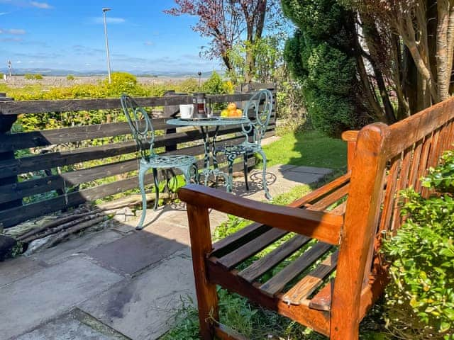 Morning coffee with a view over the estuary and Lake District mountains | Underhill Cottage, Arnside, near Grange-over-Sands