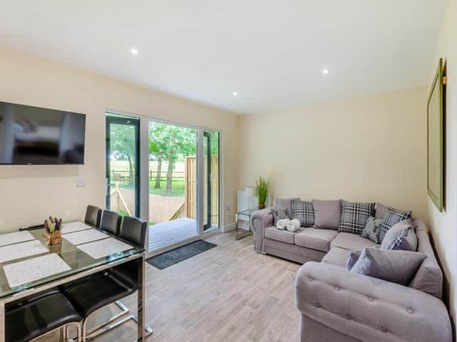 Open plan living space | Chestnut Lodge - Woodland Cottages, Halstead