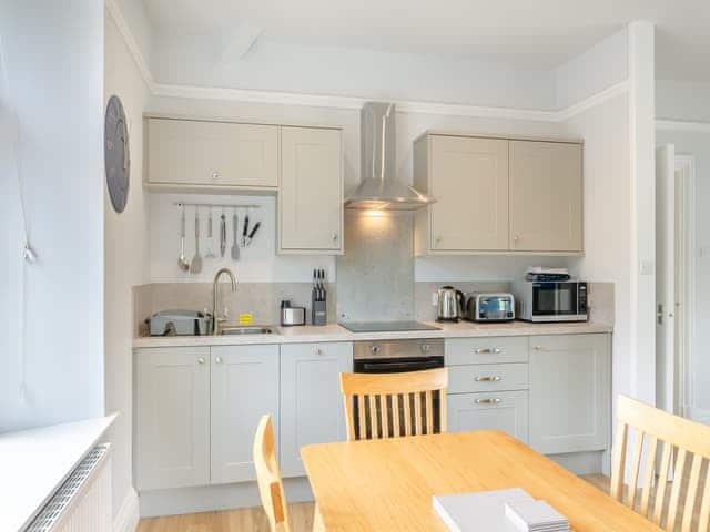 Kitchen area | Kent View Apartment - Meathop Fell Caravan Club Apartments and Cottage, Meathop, near Grange-over-Sands