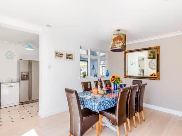 Enjoy family meals indoors or eat alfresco on the south facing rear deck with views | Tregarrek, Helston & The lizard