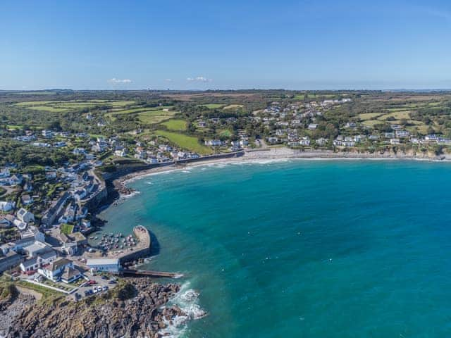 The unspoilt village of Coverack with shops, beach with turquoise water and a harbour wall to sit and each locally made ice creams. | Tregarrek, Helston & The lizard