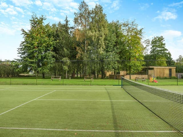 Tennis court | Copper Beech - Woodland Cottages, Halstead