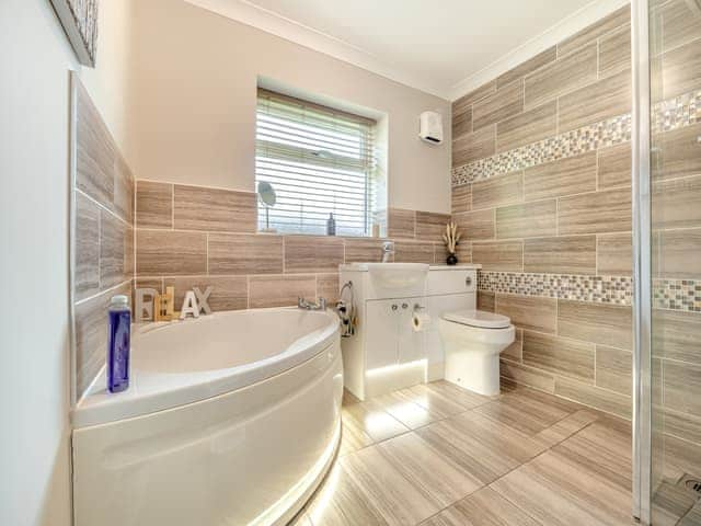 Gorgeous bathroom with shower cubicle and corner bath | Humphrey-Basil Lodge - Birchdale Lodges & Alpaca&rsquo;s, Norton Disney, near Lincoln