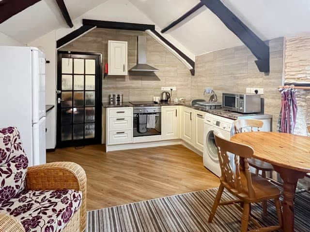 Welcoming open-plan living space | Mill Apartment - Trimstone Manor Cottages, Trimstone, near Woolacombe