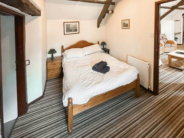 Relaxing en-suite double bedroom | Mill Apartment - Trimstone Manor Cottages, Trimstone, near Woolacombe