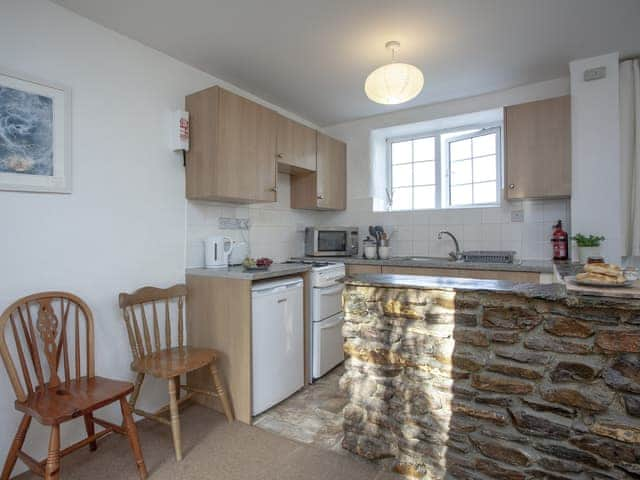 Kitchen area | Hayloft - Summercourt Cottages, Looe