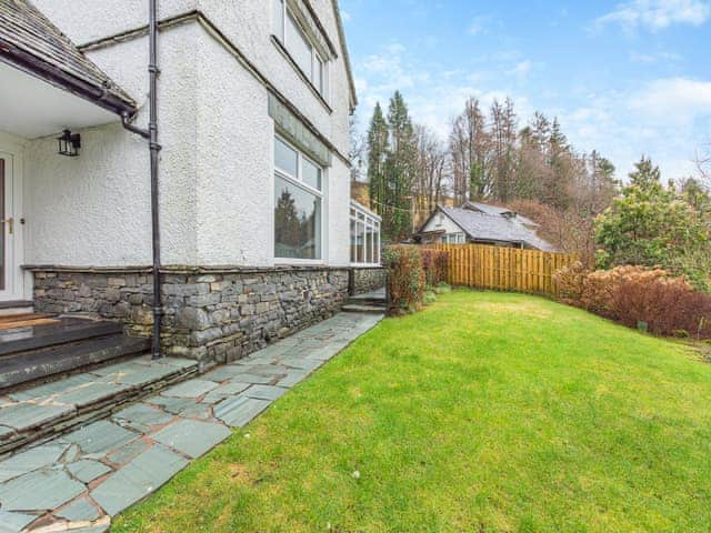 Patio and mature garden | Corner Cottage, Troutbeck Bridge, near Windermere