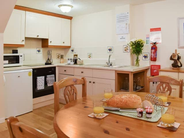 Open plan living space | Cowshed - Tokenbury Manor Cottages, Liskeard