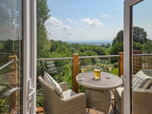 Glass fronted balcony and spectacular view | Hillside Hideaway, Newnham Forest of Dean