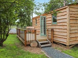 Exterior | Shepherds Hut Two - Island Hut Retreats, Rhosmeirch, near Benllech